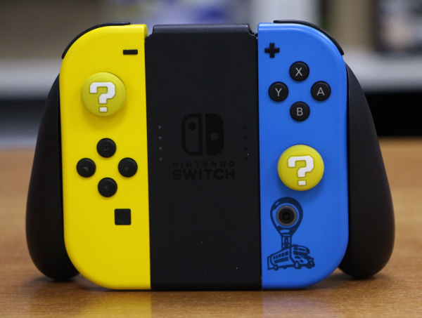 Накладки (насадки) на стики Joy Con для Nintendo Switch/Lite/Oled - Yellow Question (2шт) - интернет-магазин GameShock г. Челябинск